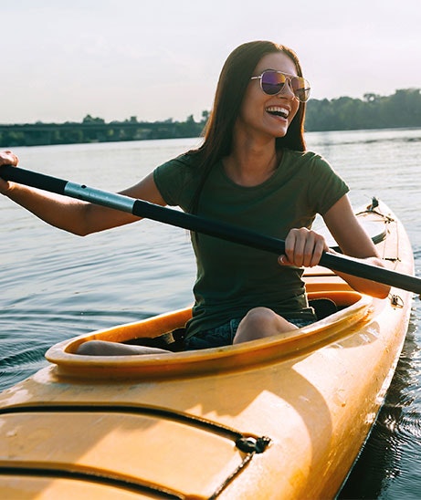 May contain: boat, canoe, kayak, rowboat, transportation, vehicle, face, head, and person